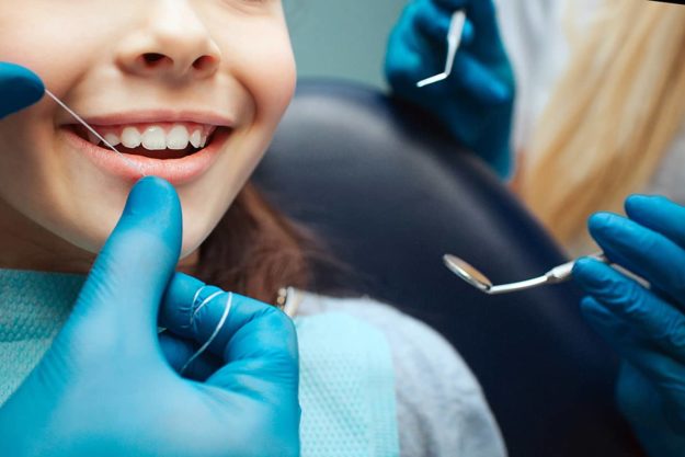 oral health young patient at dentist for oral health